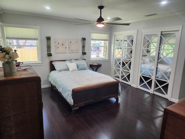 bedroom featuring crown molding, ceiling fan, and dark hardwood / wood-style flooring