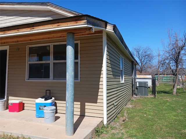 view of home's exterior featuring a lawn