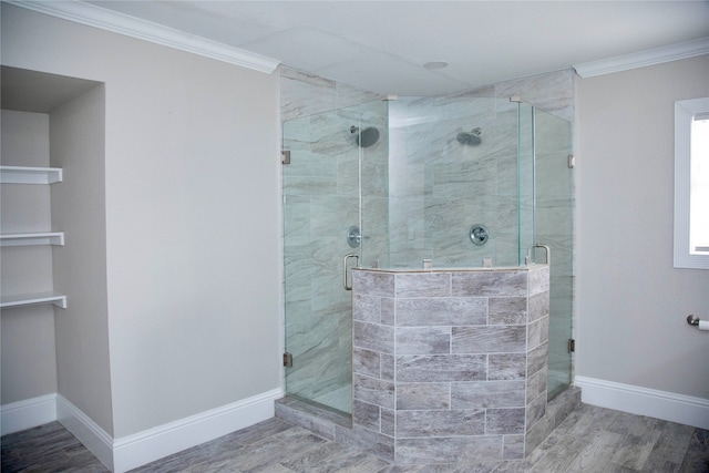 bathroom featuring ornamental molding, a shower with door, and hardwood / wood-style flooring