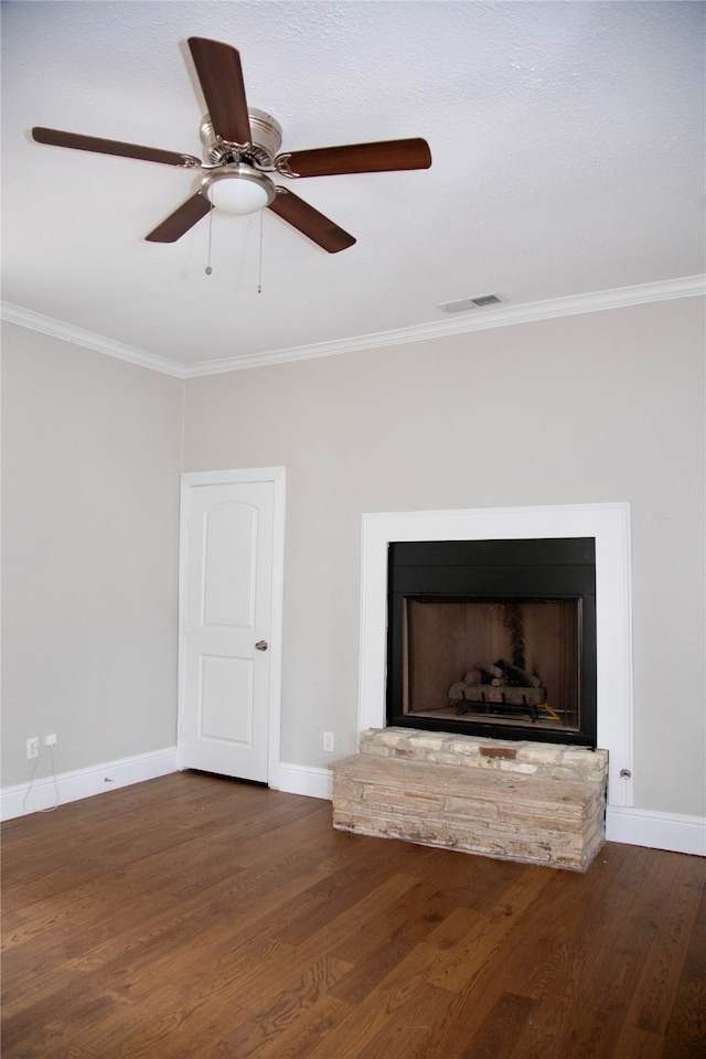 room details with ornamental molding, ceiling fan, and dark hardwood / wood-style floors