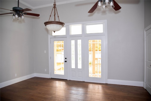 entrance foyer with dark hardwood / wood-style flooring, ceiling fan, and plenty of natural light