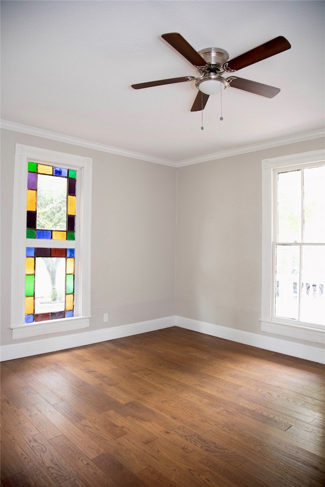 unfurnished room with ceiling fan, hardwood / wood-style flooring, and ornamental molding