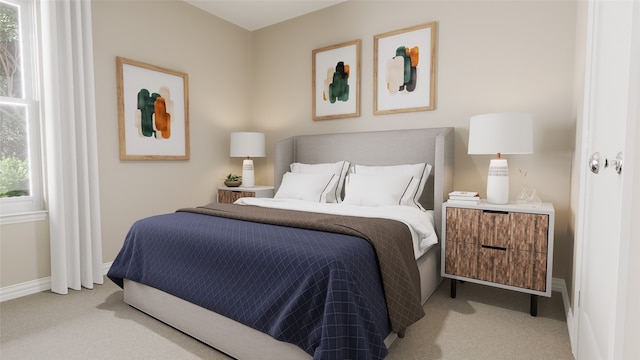 bedroom featuring light colored carpet