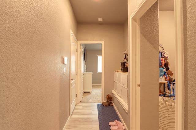 corridor featuring light wood-type flooring