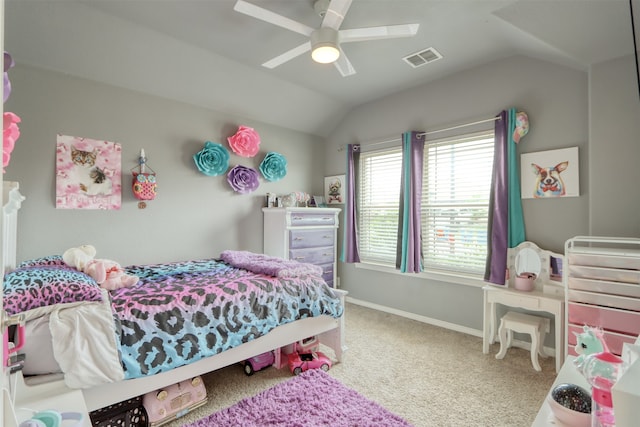 carpeted bedroom with vaulted ceiling and ceiling fan