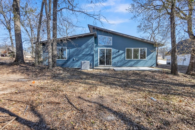 back of house with a patio area