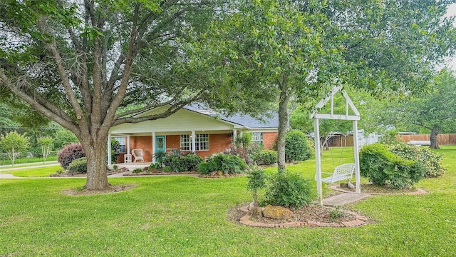 view of front of home with a front lawn and a porch