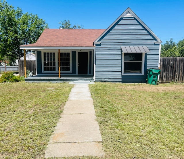 bungalow with a front lawn