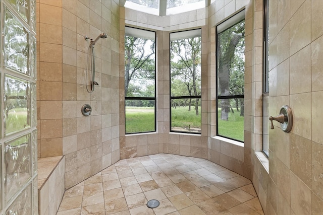 full bath with tiled shower