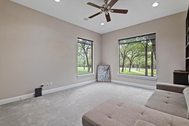 living area with carpet, baseboards, ceiling fan, and recessed lighting