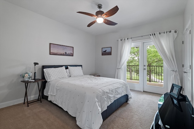 carpeted bedroom featuring baseboards, a ceiling fan, and access to exterior