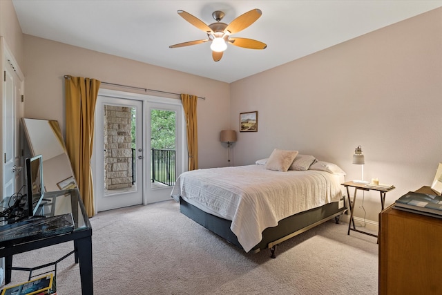 bedroom featuring access to outside, baseboards, a ceiling fan, and light colored carpet