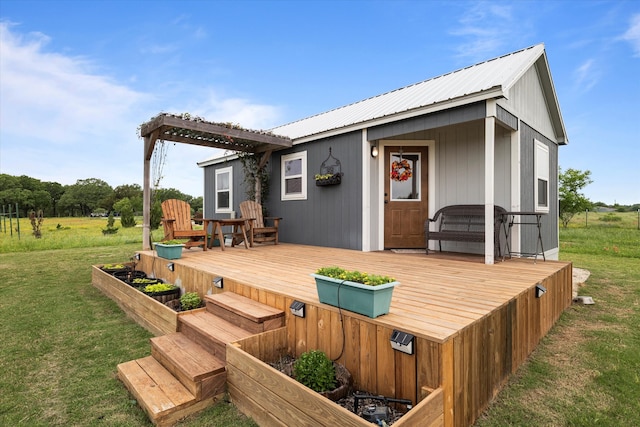 deck featuring a lawn