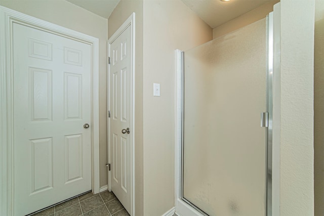 bathroom with tile flooring