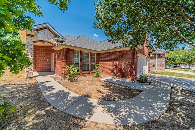 view of front of home with a garage