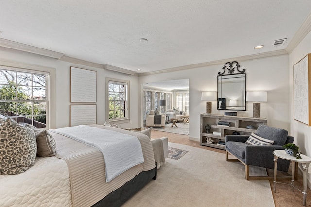 bedroom with ornamental molding, light carpet, and multiple windows