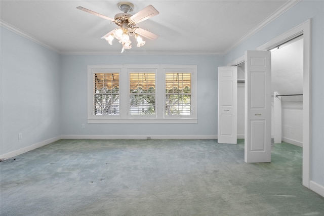 unfurnished bedroom featuring crown molding, ceiling fan, and light carpet