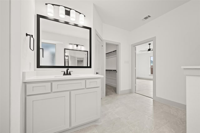 bathroom with vanity and ceiling fan