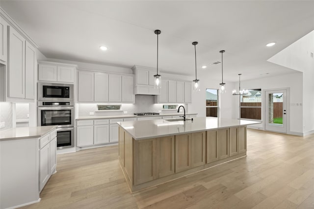 kitchen with white cabinets and a spacious island