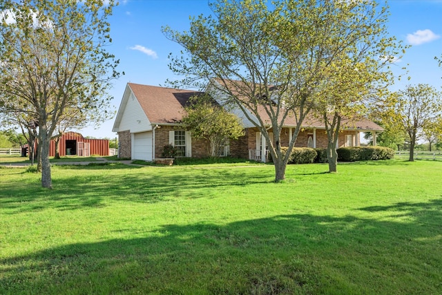 view of yard with a garage