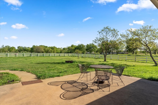 view of terrace with a rural view