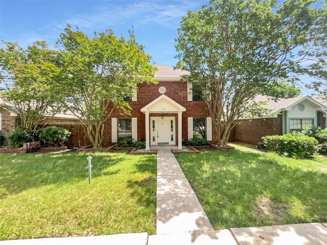 view of front of home featuring a front yard