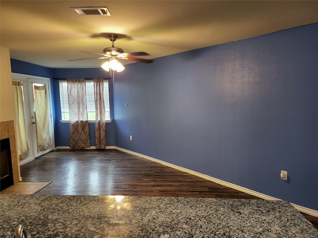 interior space featuring ceiling fan and hardwood / wood-style flooring