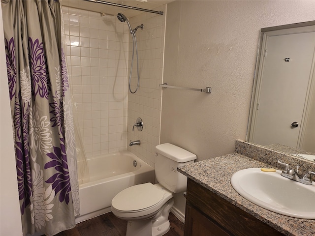 full bathroom with hardwood / wood-style flooring, shower / bathtub combination with curtain, toilet, and vanity