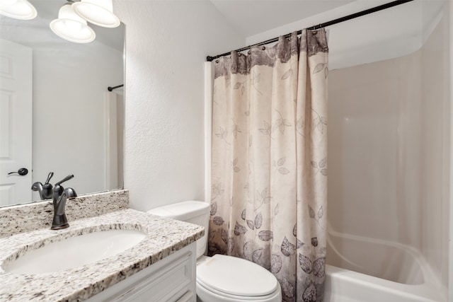 full bathroom featuring vanity, toilet, and shower / tub combo with curtain