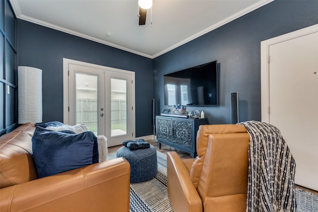 living room with hardwood / wood-style floors, crown molding, french doors, and ceiling fan