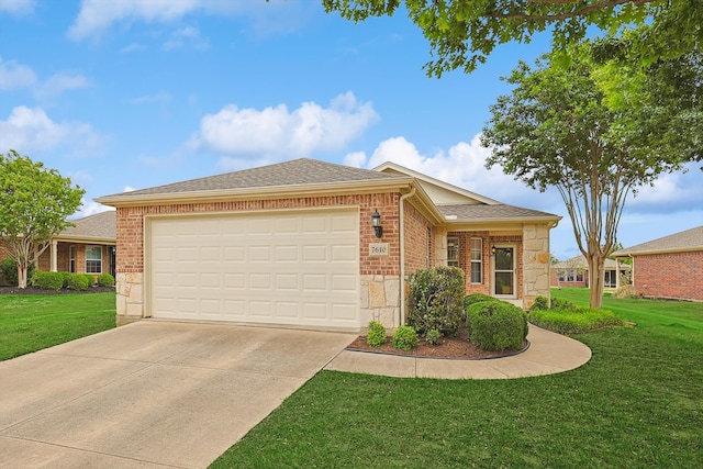 ranch-style house featuring a garage and a front lawn