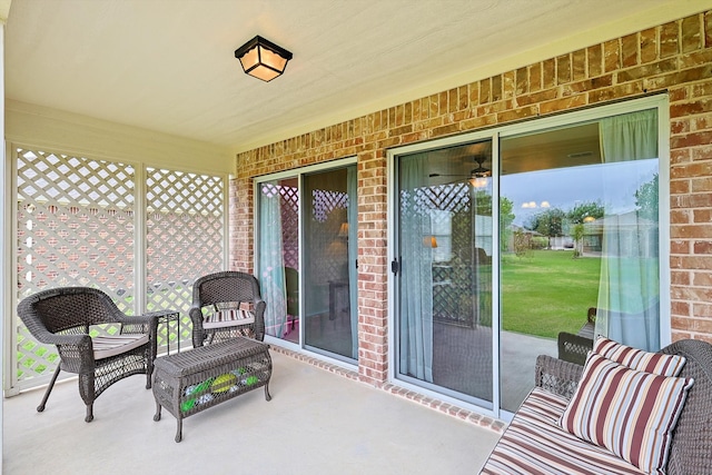 exterior space featuring ceiling fan