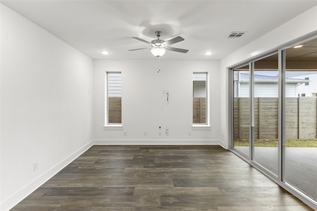 empty room with ceiling fan and wood-type flooring