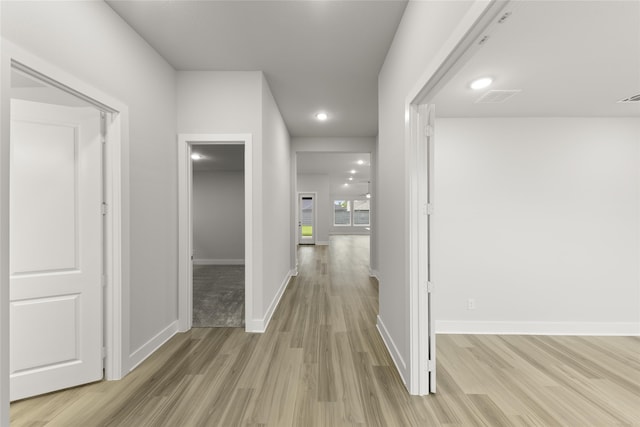 hallway featuring light hardwood / wood-style flooring