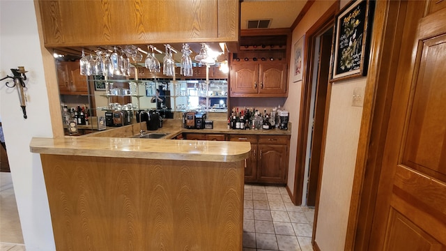 interior space featuring sink and light tile floors