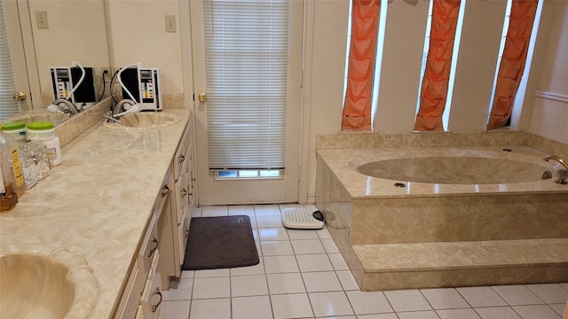 bathroom featuring vanity, tile floors, and tiled tub