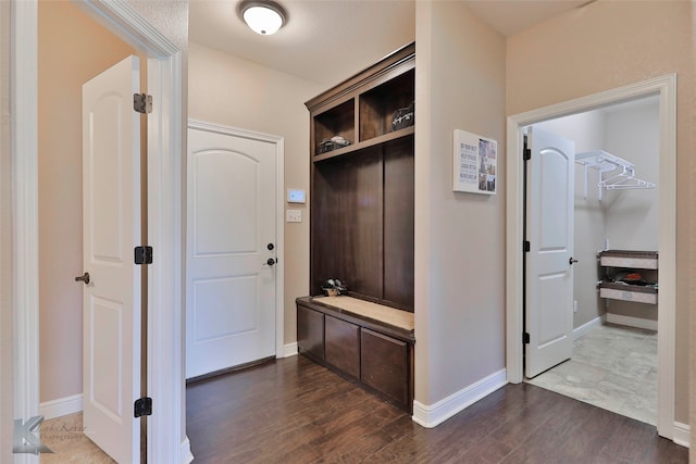 mudroom with dark wood-type flooring