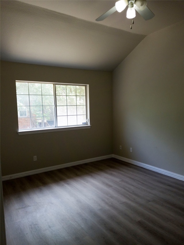 unfurnished room with lofted ceiling, ceiling fan, and dark hardwood / wood-style floors