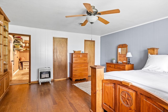 bedroom with wood-type flooring and ceiling fan