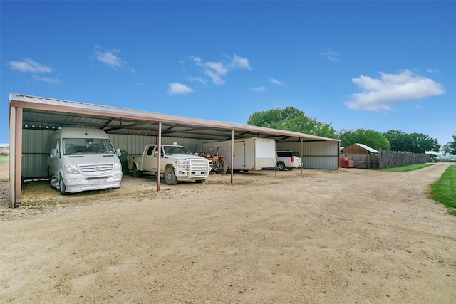 view of parking with a carport