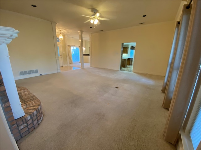 unfurnished living room featuring light carpet and ceiling fan