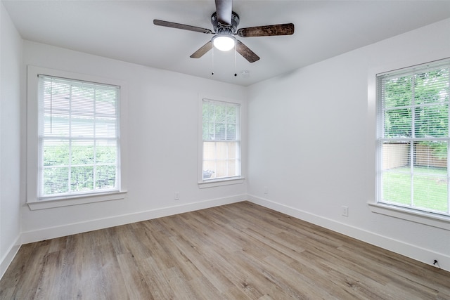 unfurnished room with light hardwood / wood-style flooring and ceiling fan