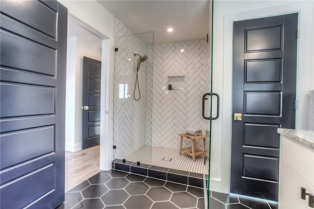 bathroom featuring tile flooring and double vanity