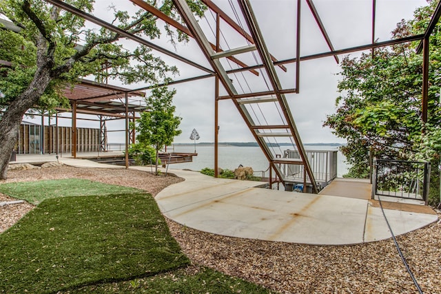 view of patio / terrace featuring a water view