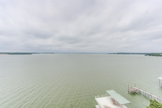 property view of water featuring a boat dock