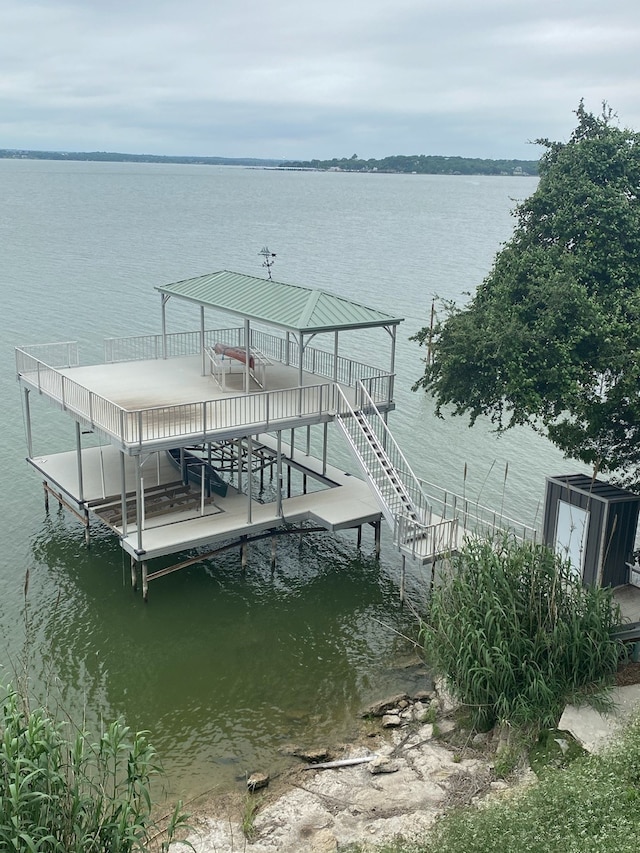 dock area with a water view