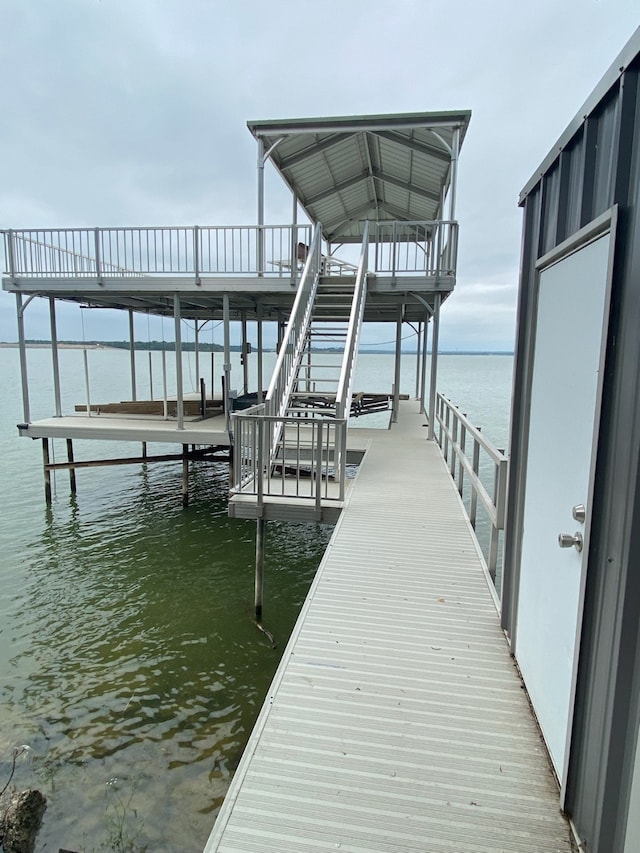 dock area with a water view