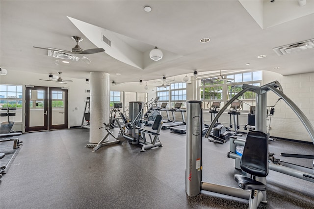 exercise room with french doors and ceiling fan