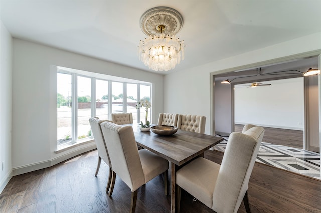 dining room with a chandelier and dark wood-type flooring