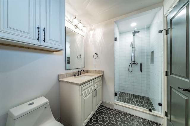 bathroom with oversized vanity, an enclosed shower, toilet, and tile flooring